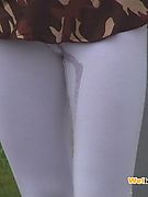 Pee-drenched white leggings of a confused girlie who pissed herself