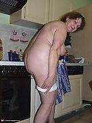 This housewife loves to get naked in the kitchen